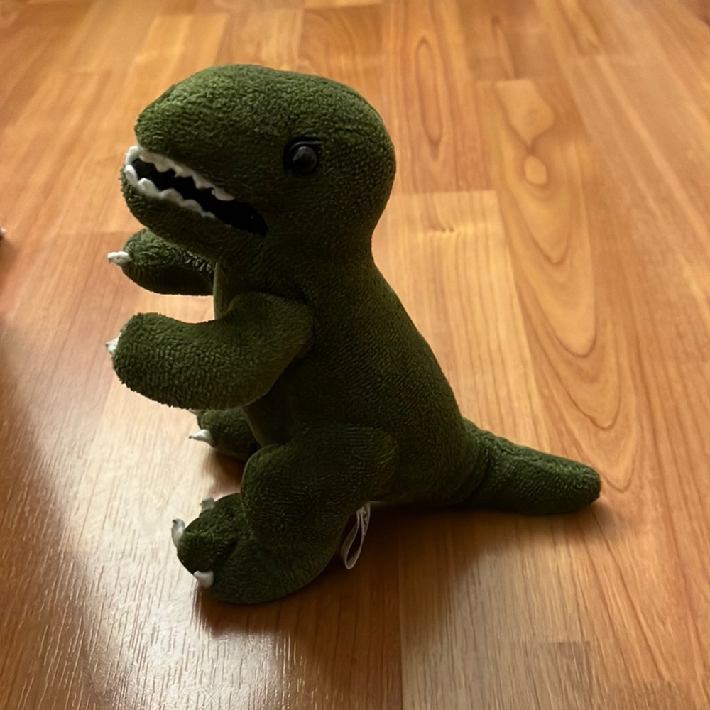 Steven Smith T. rex stuffed animal